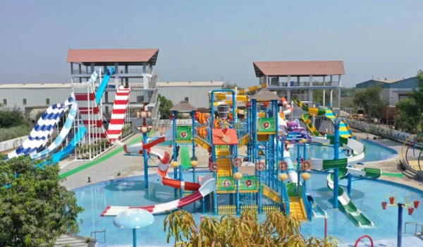 Aqua Blue Water Park Karjan – Ticket Price, Timings, Rides, Location & Corporate Visit Guide
